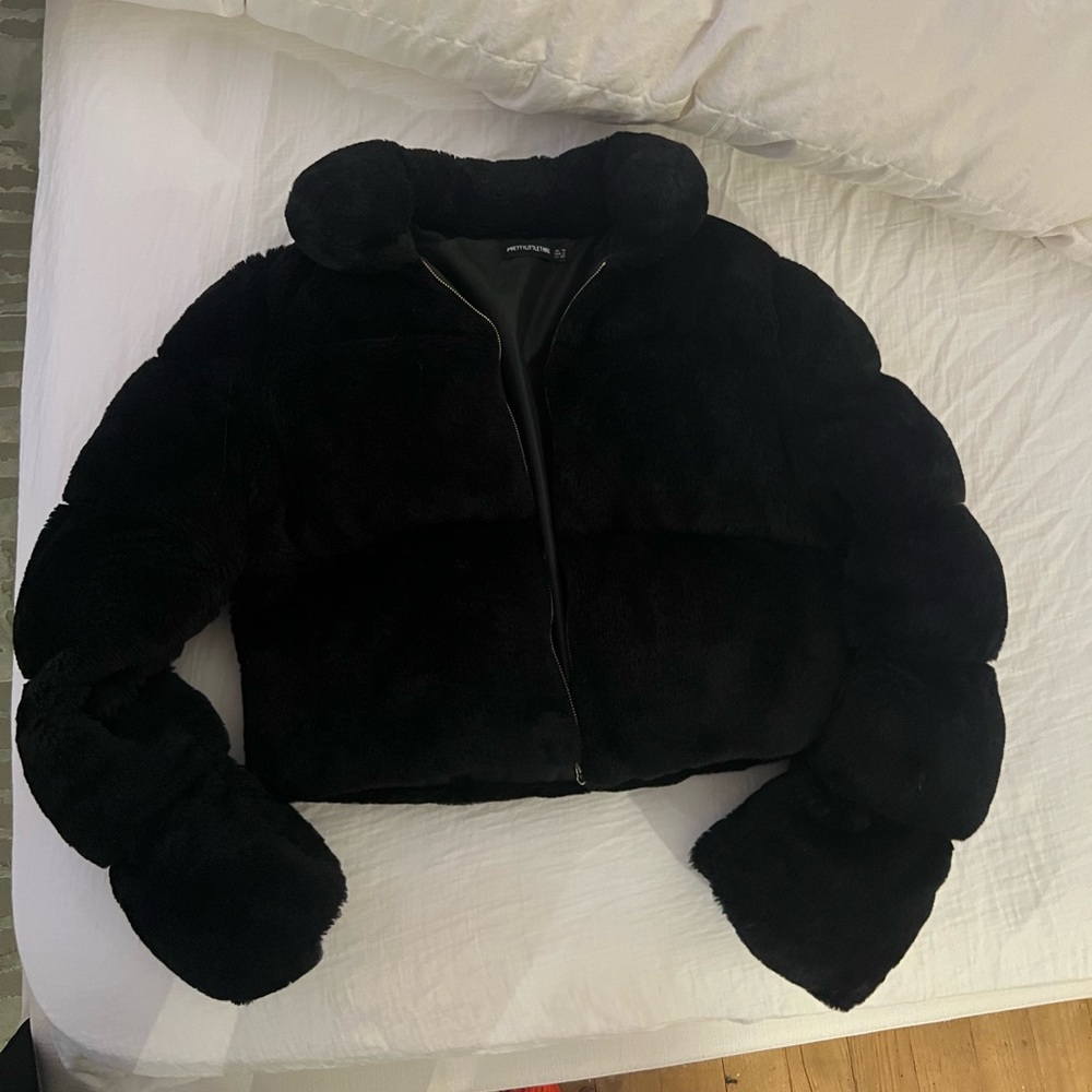Black furry puffer